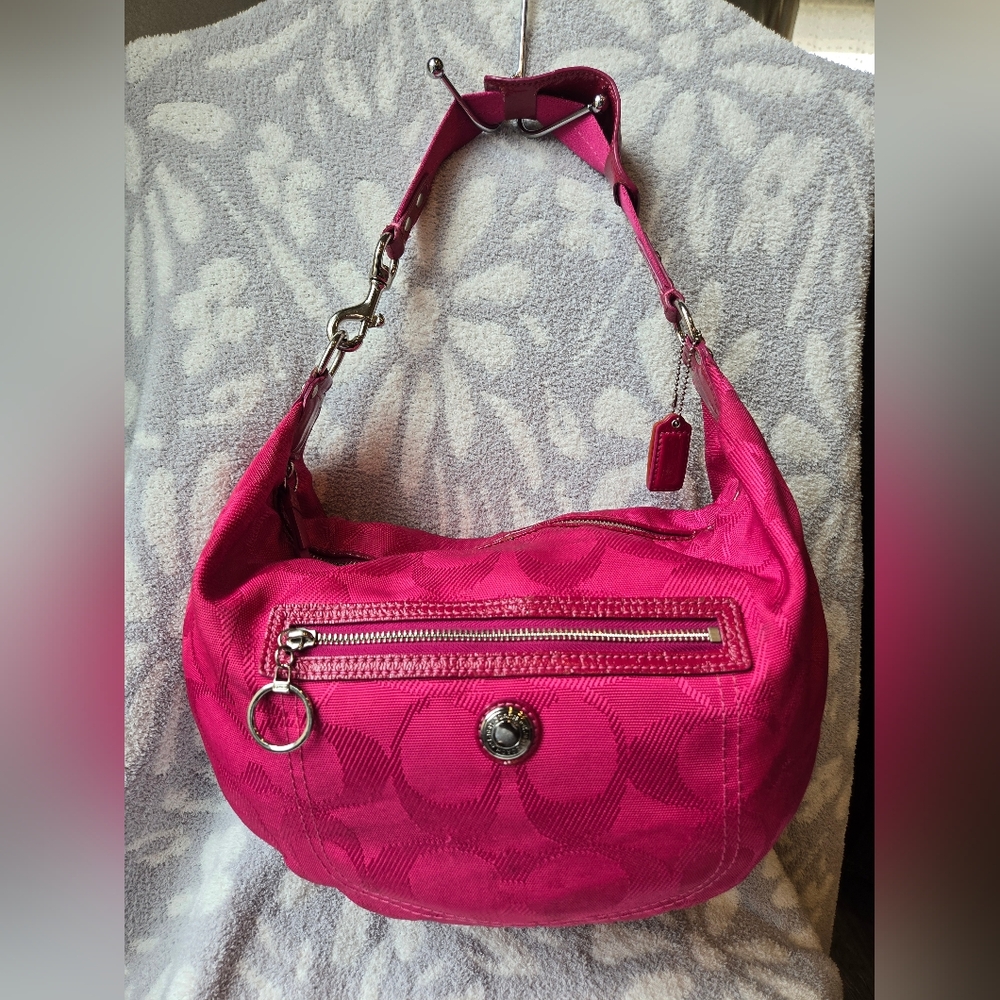 Coach pink daisy hobo bag.